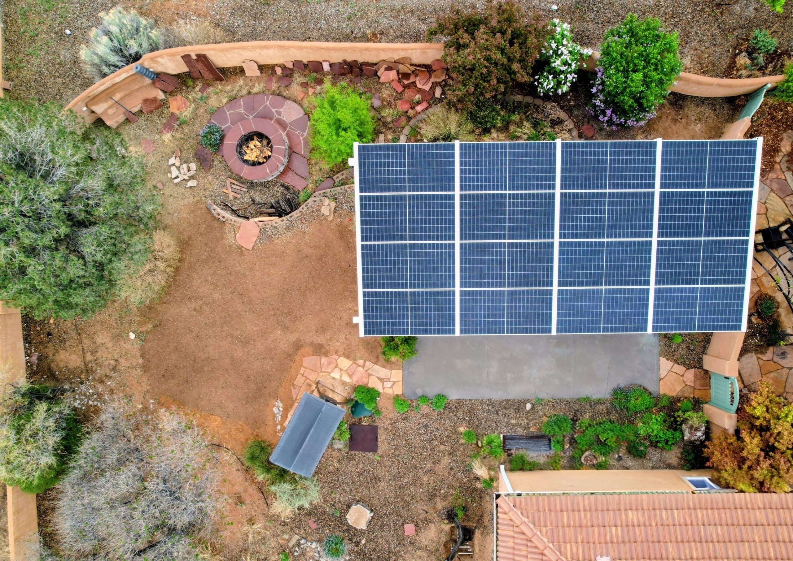 Aerial view of a wide Infinity Rack canopy in a residential property